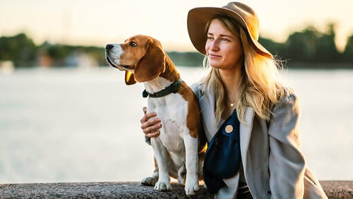 Women with Beagle near the river